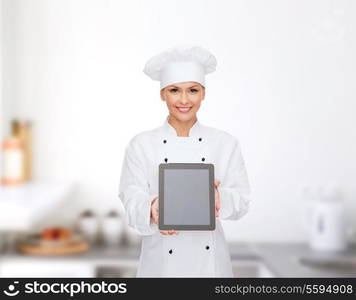 cooking, technology and food concept - smiling female chef, cook or baker with tablet pc computer blank screen