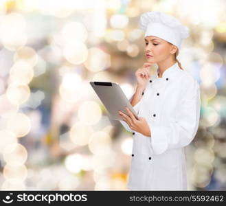 cooking, technology and food concept - smiling female chef, cook or baker with tablet pc computer