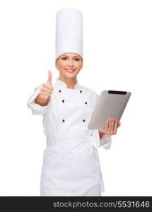 cooking, technology and food concept - smiling female chef with tablet pc computer showing thumbs up