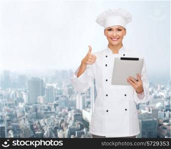 cooking, technology and people concept - smiling female chef, cook or baker with tablet pc computer showing thumbs up over city background