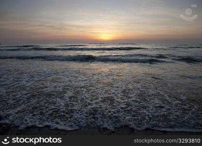 cool evening sunset over the calm beach Costa Rica