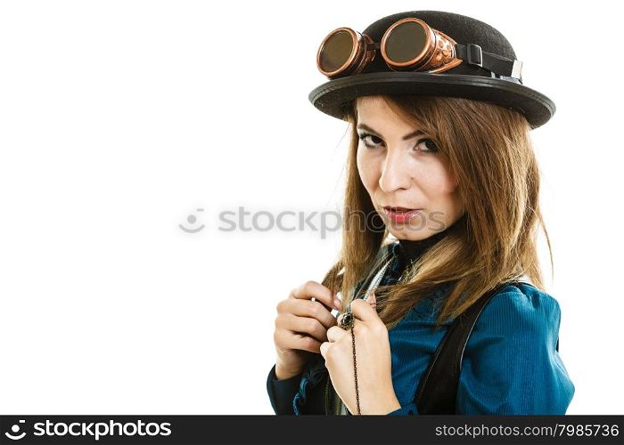 Cool girl in steampunk style.. Young steampunk islolated girl on white wearing fancy hat. Fantasy old fashion with stylish bowler and goggle.