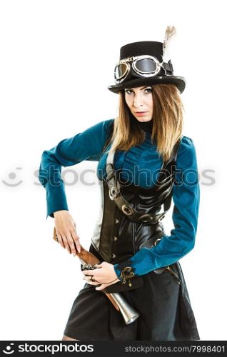 Cool girl in steampunk style.. Young steampunk islolated girl on white wearing fancy hat. Fantasy old fashion with stylish topper goggle drawing gun.