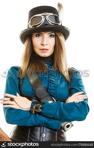 Cool girl in steampunk style.. Young steampunk islolated girl on white wearing fancy hat. Fantasy old fashion with stylish topper and goggle posing.