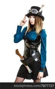 Cool girl in steampunk style.. Young steampunk islolated girl winking on white wearing fancy hat. Fantasy old fashion with stylish topper goggle and gun.