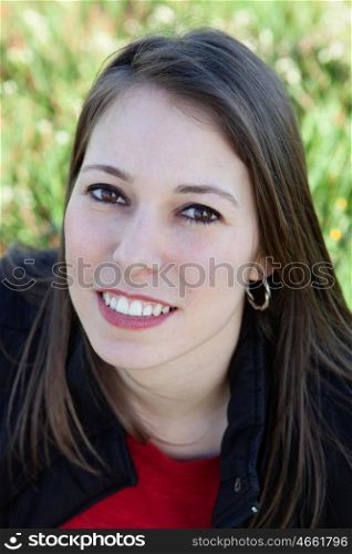 Cool girl with brown eyes looking at camera outside