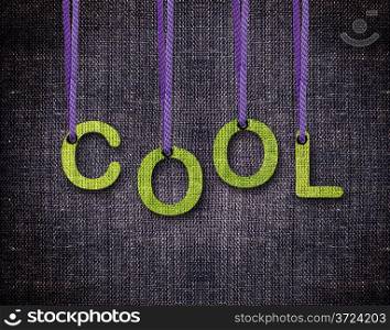 Cool Letters hanging strings with blue sackcloth background.. Cool