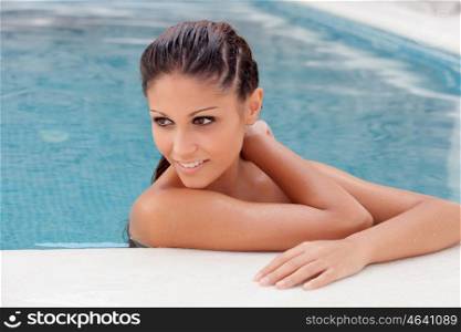 Cool pretty girl taking a dip in the pool