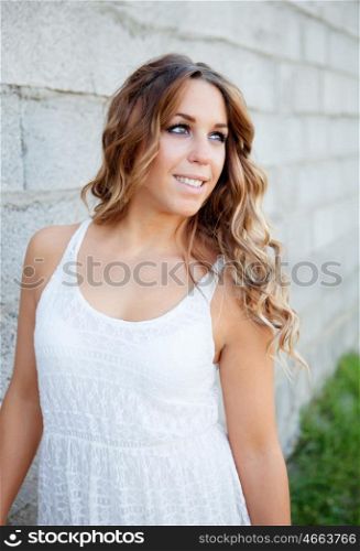Cool pretty woman with white dress an a beautiful smile
