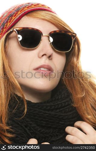 cool redhead woman wearing sunglasses in winter dress. cool redhead woman wearing sunglasses in winter dress on white background