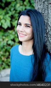 Cool smiling girl with black hair outside