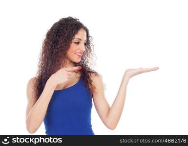 Cool woman with big eyes pointing her hand isolated on a white background