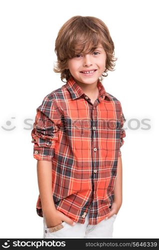 Cool young boy posing over white background