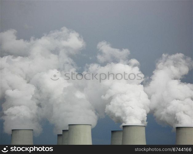 cooling towers. cooling towers of a coal power plant, white steam