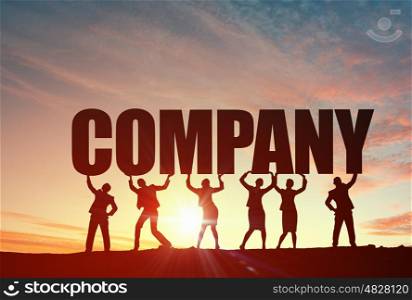 Cooperate for successful work. Business people lifting word company representing collaboration concept