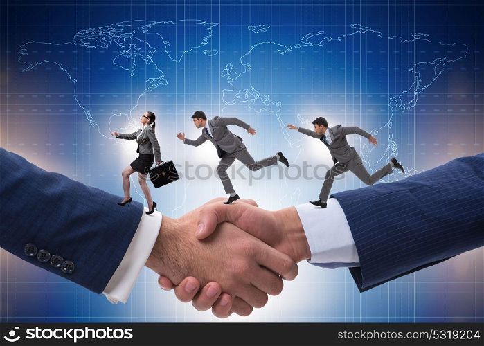 Cooperation concept with people running on handshake. The cooperation concept with people running on handshake