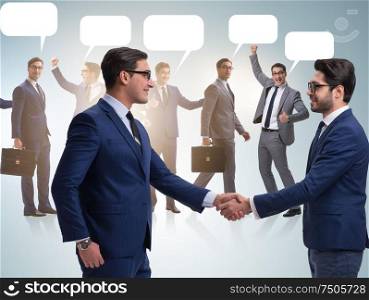 Cooperationa and teamwork concept with handshake. The cooperationa and teamwork concept with handshake