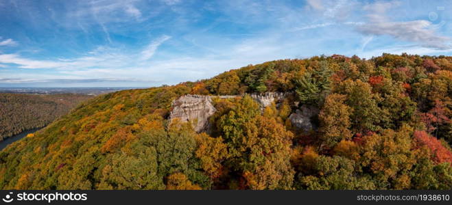 Coopers Rock state park overlook over the Cheat River in narrow wooded gorge in the autumn. Park is near Morgantown, West Virginia. Coopers Rock state park overlook over the Cheat River in West Virginia with fall colors