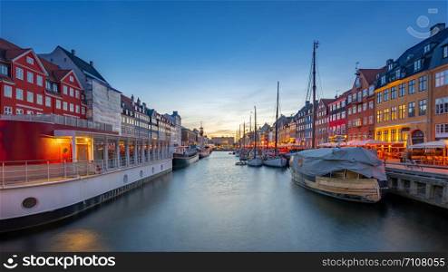 Copenhagen city at night with view of Nyhavn in Denmark.