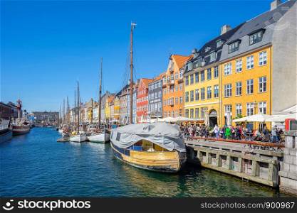 Copenhagen, Denmark - May 2, 2017: Colorful buildings of Nyhavn in Copenhagen city, Denmark.