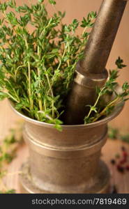 copper mortar with herbs