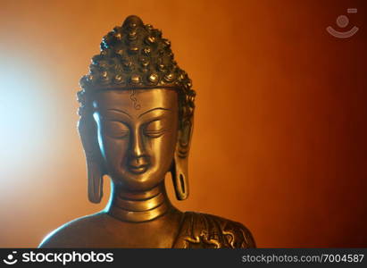 Copper statuette of Buddha, Buddha&rsquo;s face close-up