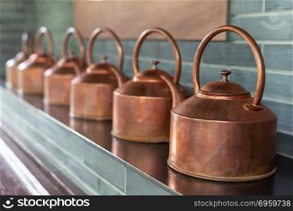 Copper teapots in a row. Copper teapots in a row in Chengdu, China