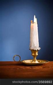 copy space candle on blue background