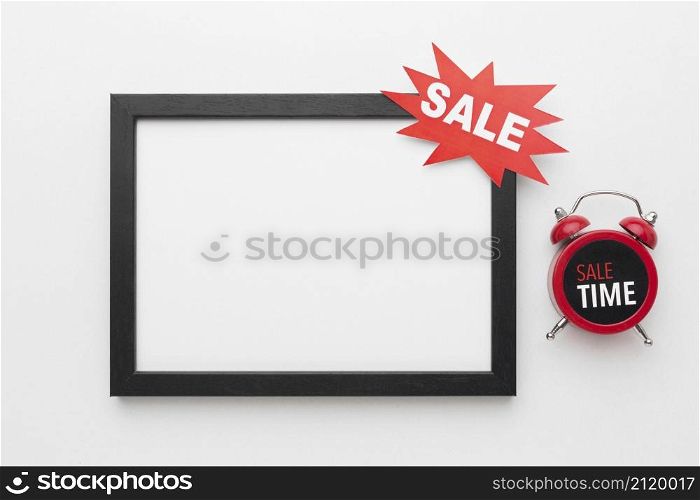 copy space frame with sale label clock