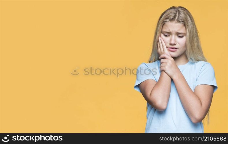 copy space little girl with tooth pain