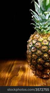 copyspace view of ananas on wooden board