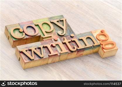 copywriting banner - word abstract in colorful letterpress wood type printing blocks against grained wood