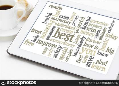 copywriting power words - word cloud on a digital tablet with a cup of coffee