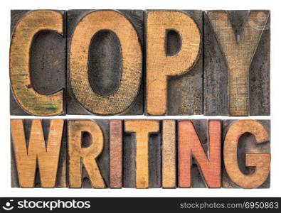 copywriting word abstract - isolated text in vintage letterpress wood type stained by color inks