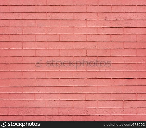 Coral Brick wall texture close up. Top view. Modern brick wall wallpaper design for web or graphic art projects. Abstract background for business cards and covers. Template or mock up.. Coral Brick wall texture close up. Top view.