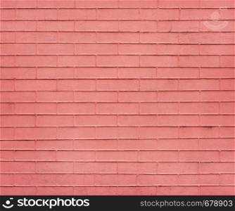 Coral Brick wall texture close up. Top view. Modern brick wall wallpaper design for web or graphic art projects. Abstract background for business cards and covers. Template or mock up.. Coral Brick wall texture close up. Top view.
