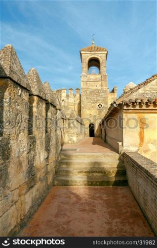 Cordova. Royal palace of the cristian kings. Stone walls and towers of the Alcazar de los reyes cristianos in Cordoba. Spain. Andalusia.