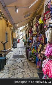 Corfu, Greece - 26 August, 2018: Greek alley on the Corfu island in Corfu town.. Greek alley on the Corfu island in Corfu town.