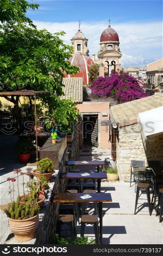CORFU, GREECE - CIRCA MAY 2019 Open air cafe near entrance of New fortress in Old town