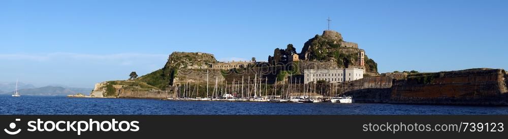 CORFU, GREECE - CIRCA MAY 2019 Panorama of marina and Old fortress