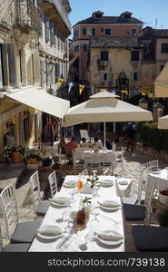 CORFU, GREECE - CIRCA MAY 2019Tables on the street