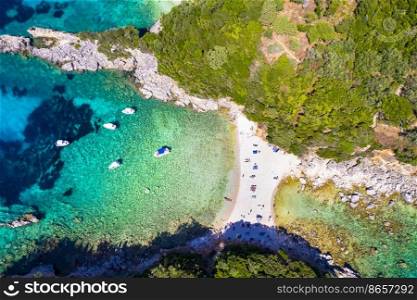 Corfu island, Greece . Aerial drone view of beautiful double beach with turquoise clear waters Limni beach Glyko near Paleokastritsa
