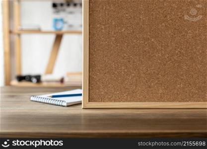 Cork board frame background at table in office. Student home place
