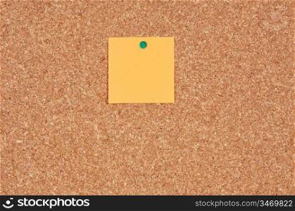Cork noticeboard with a color note a over white background