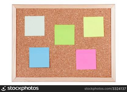Corkboard with empty coloured notes, isolated on white background.