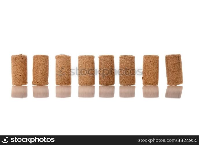 Corks from bottles guilt on white background.