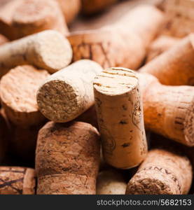 Corks on the wooden table. Wine and alcohol concept