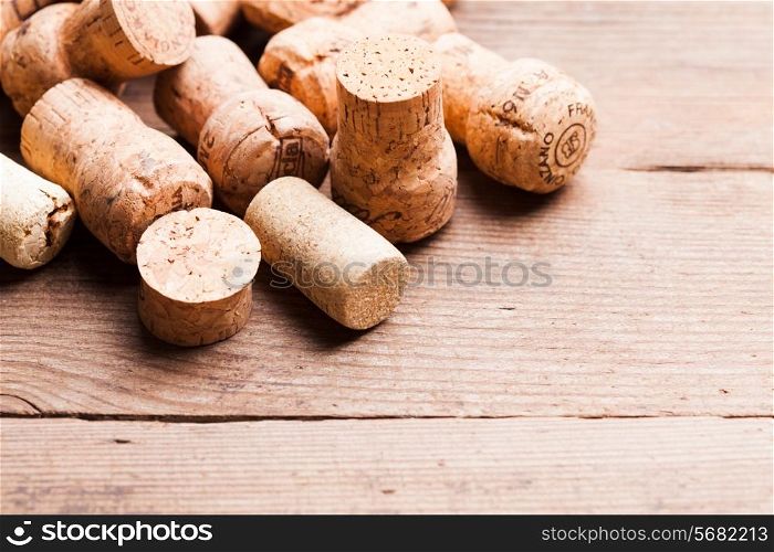 Corks on the wooden table. Wine and alcohol concept