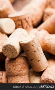Corks on the wooden table. Wine and alcohol concept
