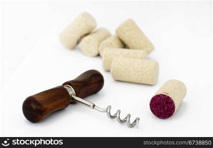 Corkscrew and cork white isolated